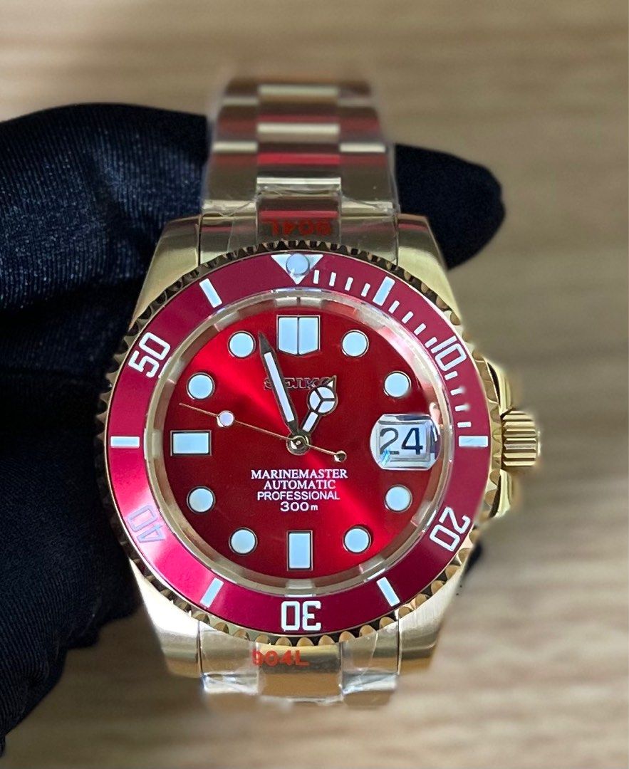 Red and gold watch on sale
