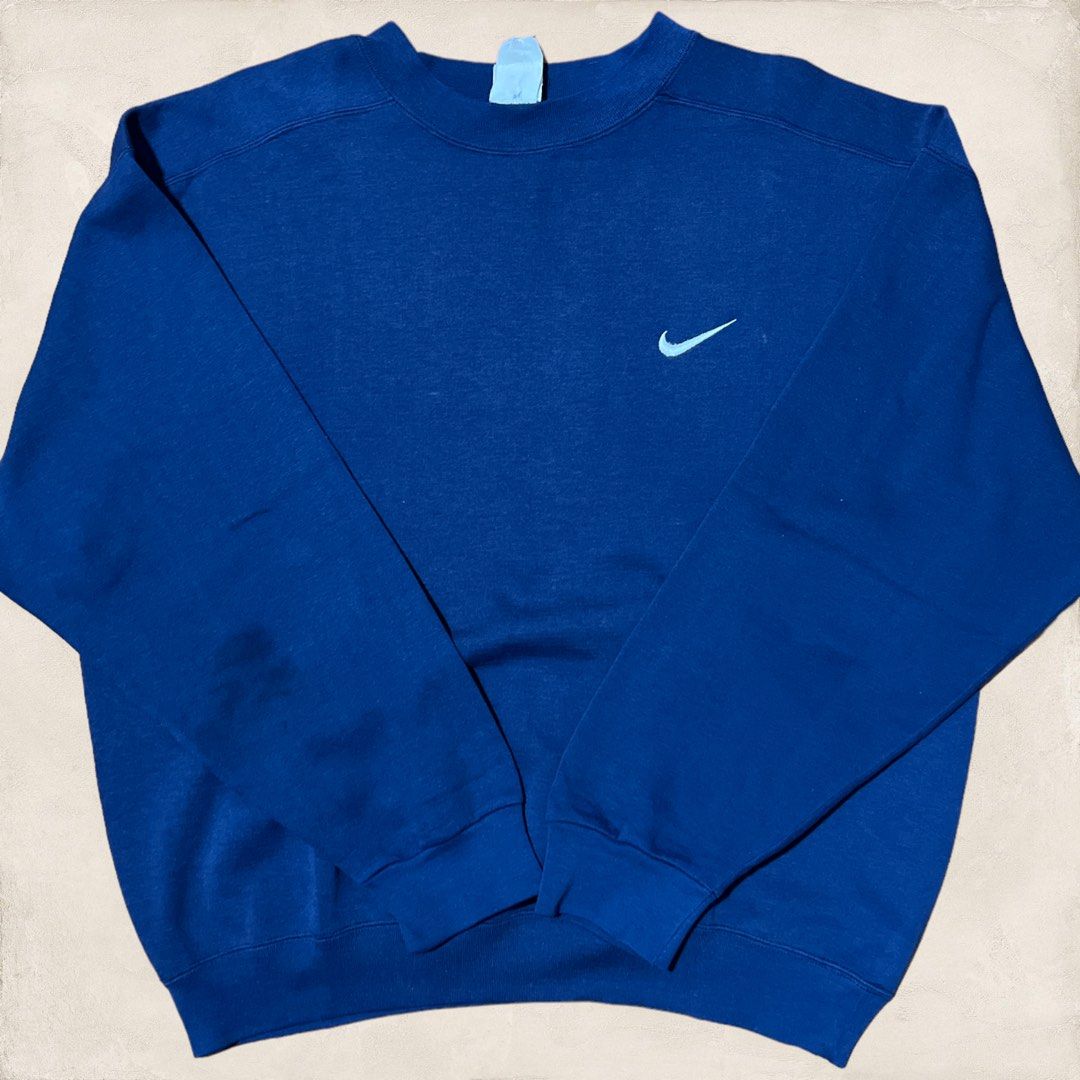 Blue nike swoosh sweatshirt clearance