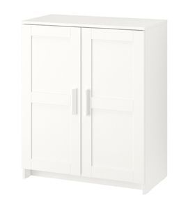 Ikea White Cabinet with doors in new condition