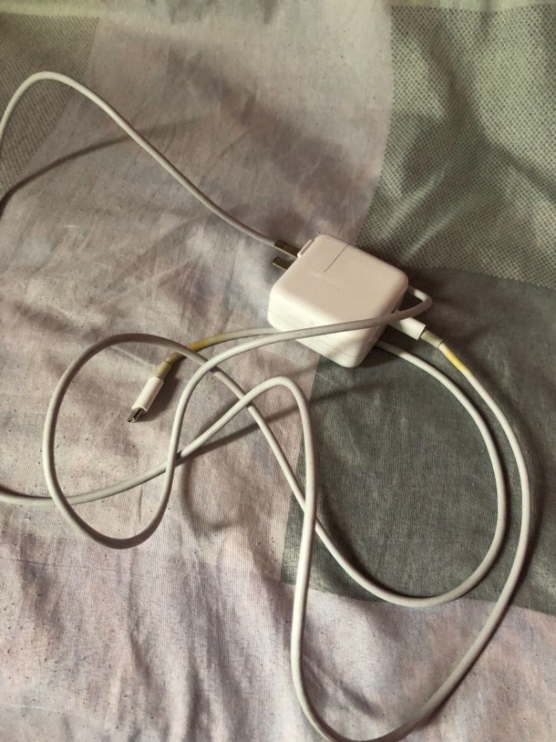 Macbook Type-C Charger (Category: Chargers) located in Pasig City. Submitted by nicll (Listing ID 1211383356, Image 2). Description: Still in very good condition Rfs: Extra.