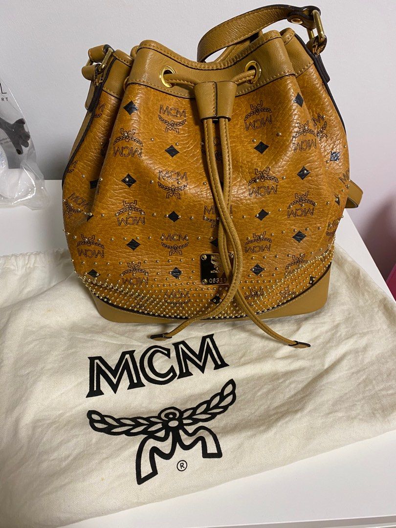 Mcm bucket bag price store