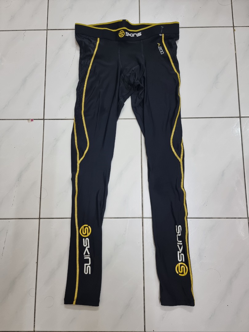 Skins A200 Men's Thermal Compression Long Tights  Compression tights men, Compression  clothing, Skins compression tights