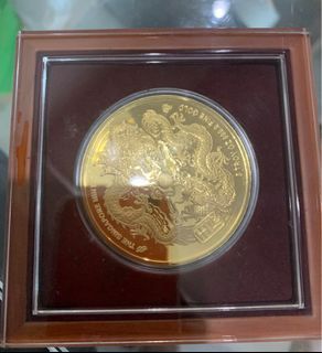 9999 gold from singapore mint 5oz dragon comes with certificate. No 56 of 88