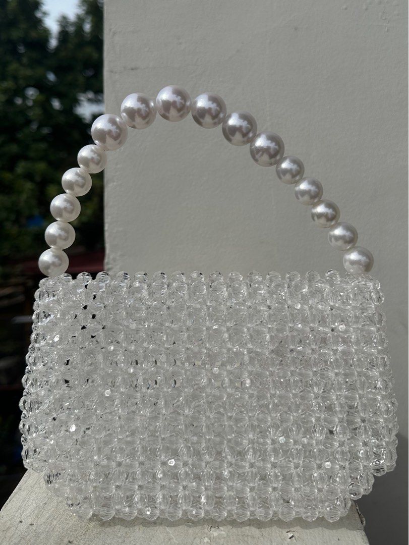 Beaded Purse bag (Category: Purses & Pouches) located in Cavite. Submitted by daphnesea (Listing ID 1211606436, Image 2). Description: Beaded bag bought from @clubkalee on ig. Only used once for an event last December 2022. Shipping from Bacoor or Makati depending on sched.