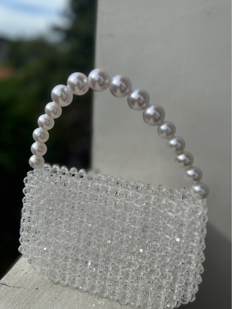 Beaded Purse bag (Category: Purses & Pouches) located in Cavite. Submitted by daphnesea (Listing ID 1211606436, Image 1). Description: Beaded bag bought from @clubkalee on ig. Only used once for an event last December 2022. Shipping from Bacoor or Makati depending on sched.
