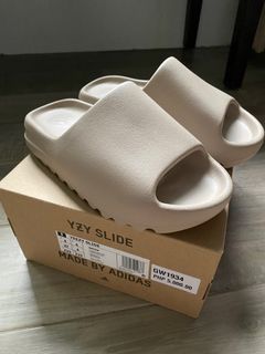 Brand new and authentic Yeezy Slide in Pure US Size 4