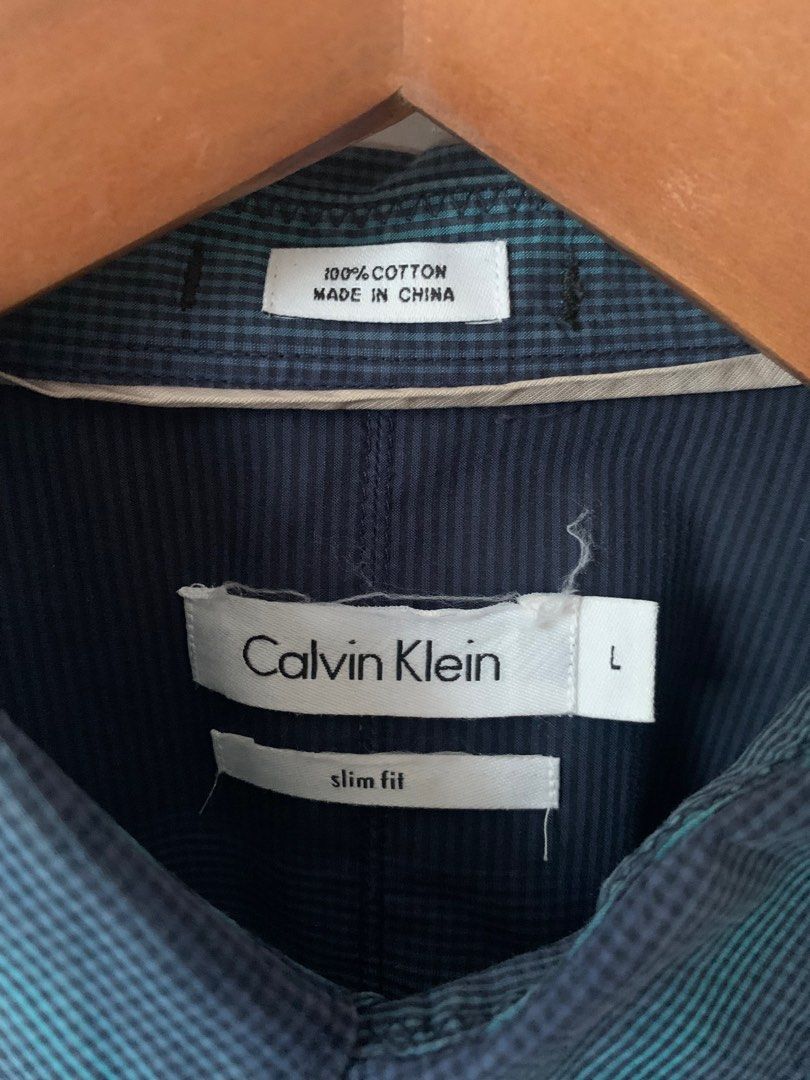 Calvin Klein (Original), Men's Fashion, Tops & Sets, Formal Shirts on  Carousell