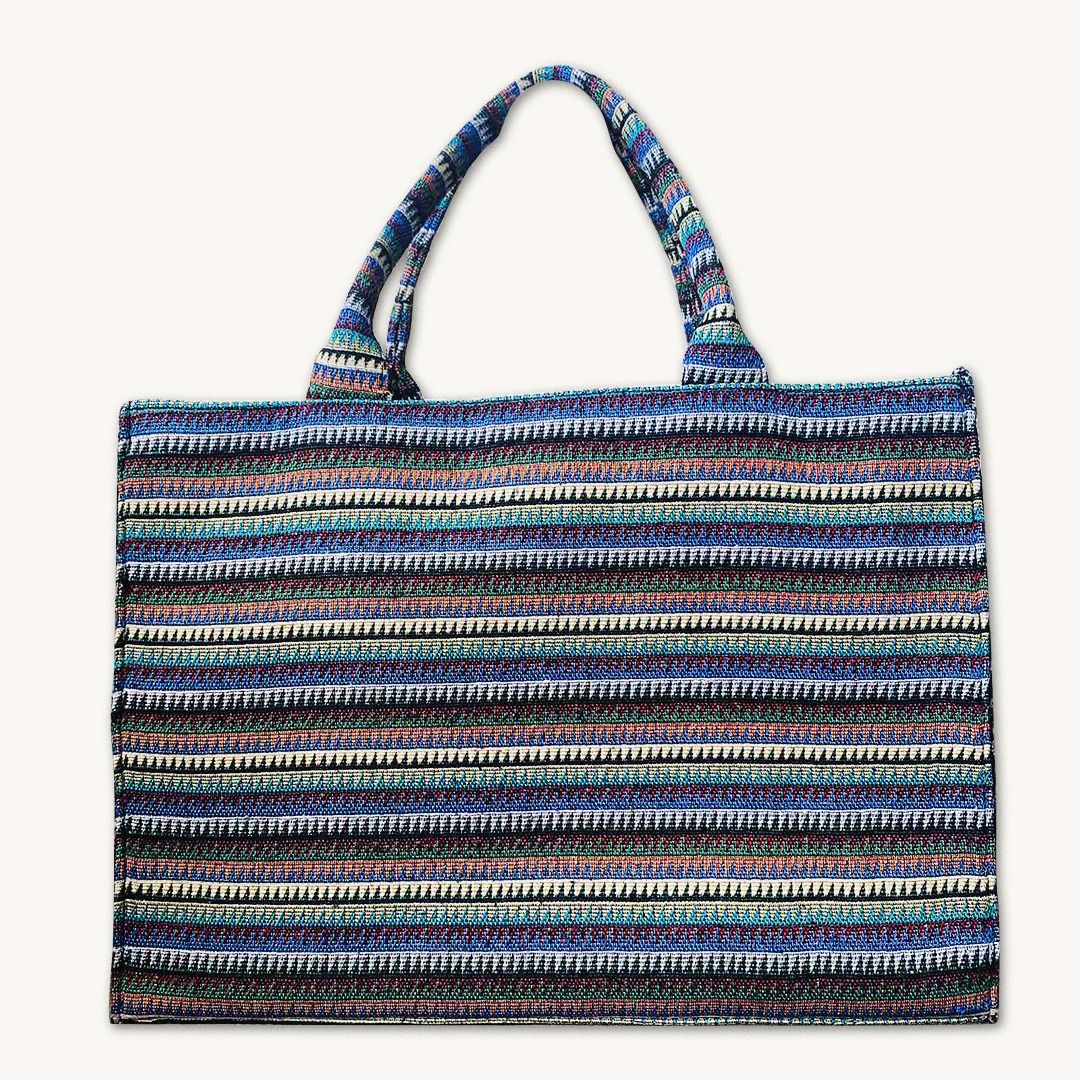 Kultura Tote/Shoulder Bag (Category: Tote Bags) located in Balanga. Submitted by mauseu (Listing ID 1194971985, Image 1). Description: Dimensions [H×W×D] : - 30×42×12 cm (11.8×16.5×4.74 inches) - Handle drop: 16.5 cm (6.5 inches) The bag is stiff/structured, so it can stand on its own. It has woven detailing and fabric lining inside. The closure is a magnetic button and there is a small pocket inside. It can comfortably fit: - 22oz Aquaflask bott