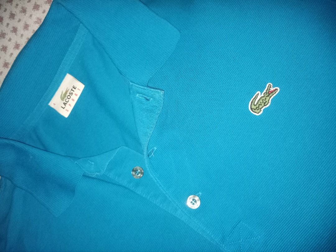Lacoste Polo Shirt (Category: Tshirts & Polo Shirts ) located in Manila. Submitted by da666ul (Listing ID 1211669451, Image 3). Description: Lacoste Size 4 19x27 issue: unnoticeable pinhole on back right sleeve.