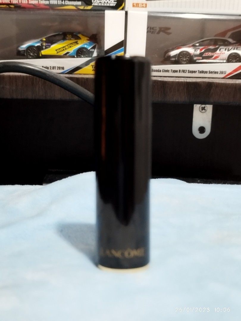Lancome Lipstick (Category: Makeup) located in Guiguinto. Submitted by clayne30 (Listing ID 1211557766, Image 1). Description: ORIGINAL LANCOME LIPSTICK Bought it at Canada SHADE CAPRICE 132 Red color actual press the flower on the top and it will open the lipstick unique style.