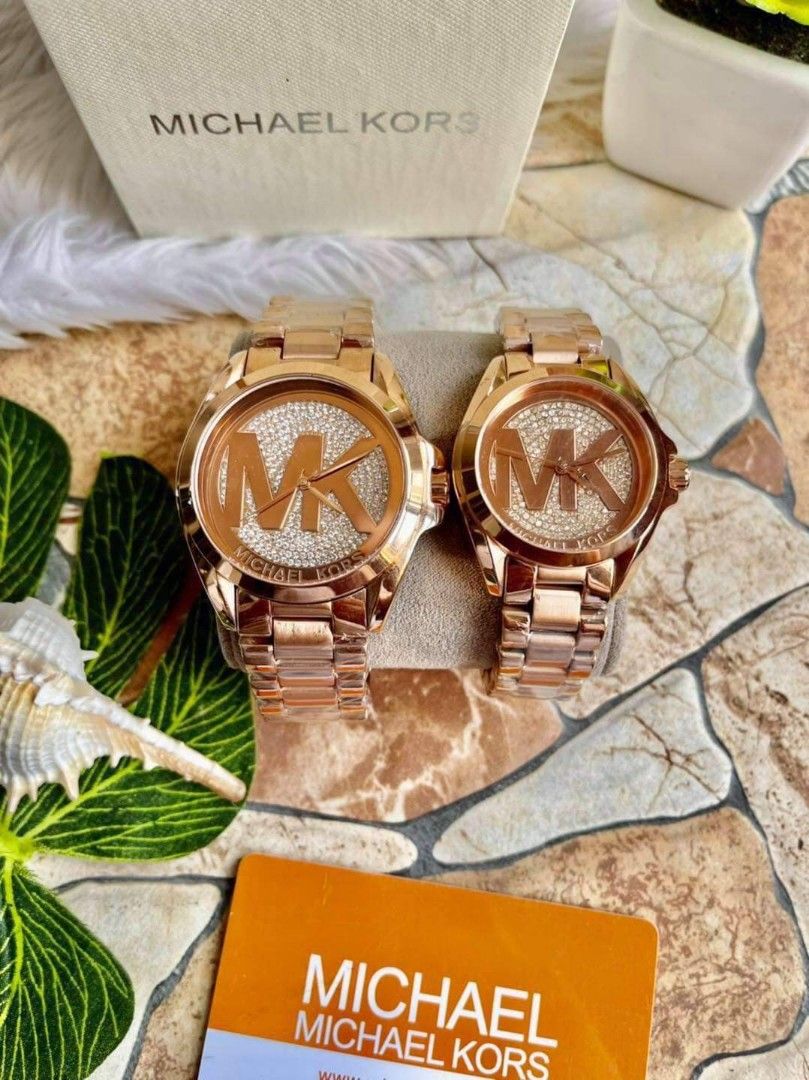 Watch with m logo clearance