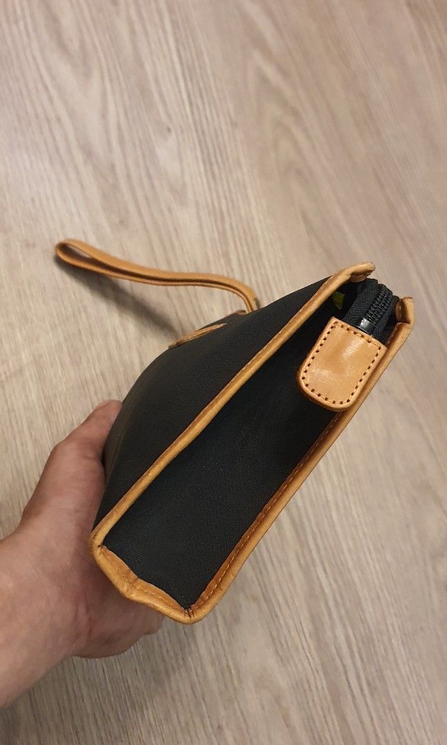 Authentic courreges clutch bag (Category: Luxury Bags & Wallets) located in Cavite. Submitted by ohmie23 (Listing ID 1211770533, Image 3). Description: Authentic courreges clutch bag.