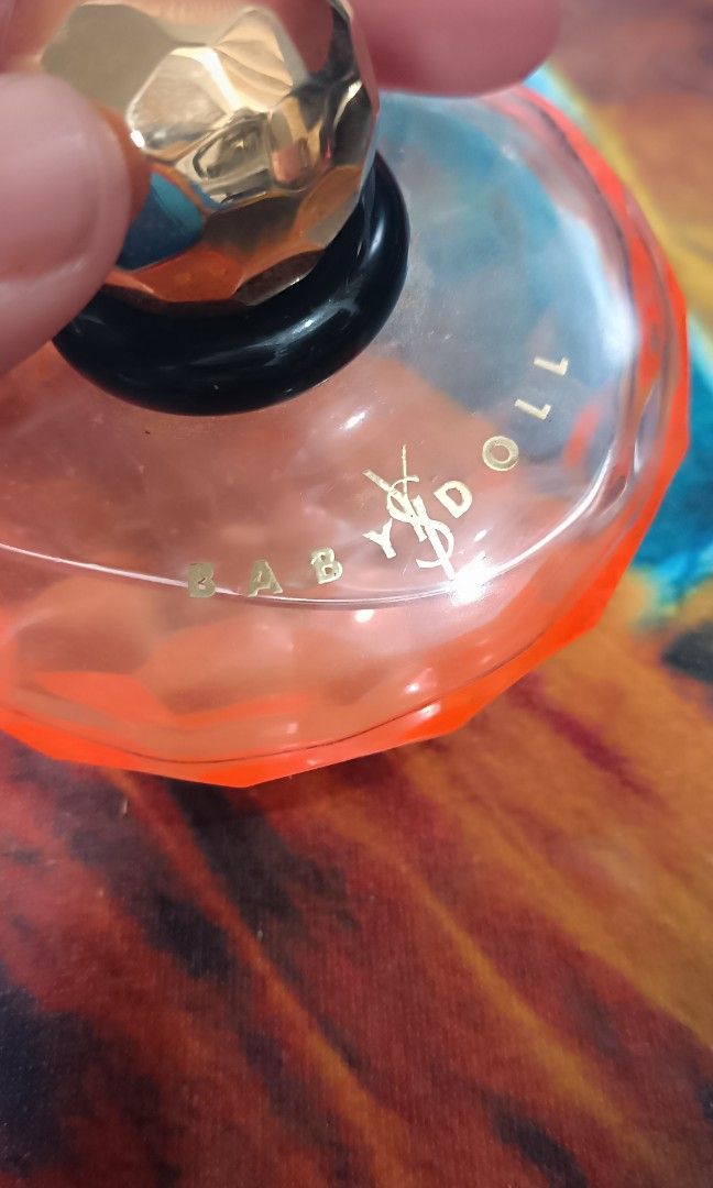 Authentic ysl baby doll, Luxury, Accessories on Carousell