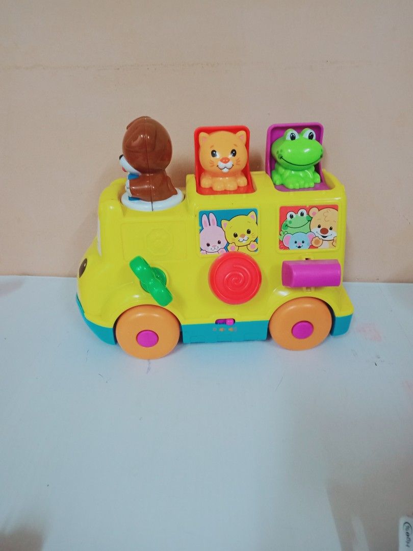 Fisher price musical sales pop up bus