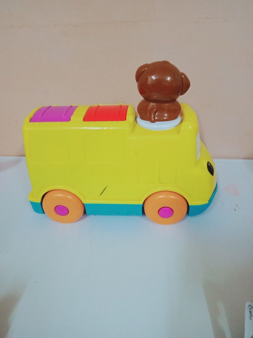 Fisher price musical store pop up bus