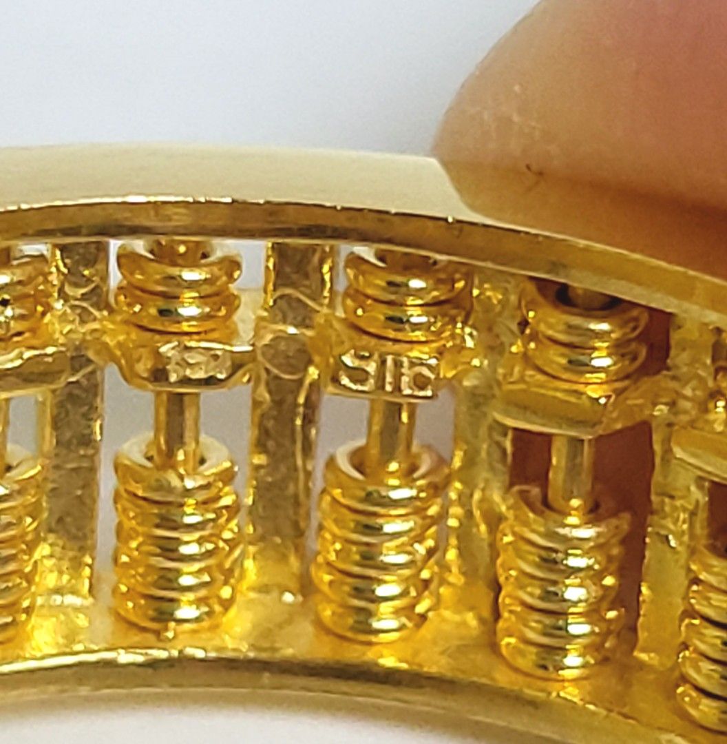 Abacus gold ring meaning sales