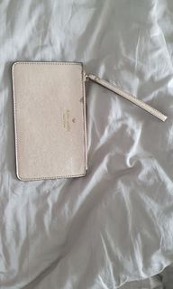 Kate Spade New York gold clutch with wrist strap