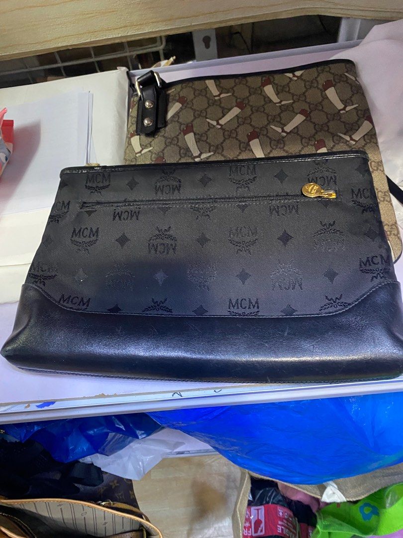 MCM black clutch (Category: Luxury Bags & Wallets) located in Butuan. Submitted by natalday (Listing ID 1211785363, Image 2). Description: .
