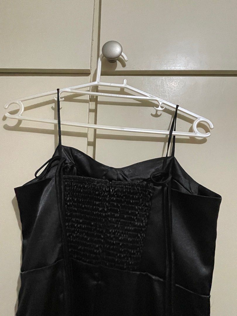 Satin black dress with slit (Category: Dresses) located in Cavite. Submitted by therkive (Listing ID 1211829025, Image 3). Description: Used/fitted once. Not the right fit for me Brand: whoopyclothing Braxley satin dress No when worn photos.