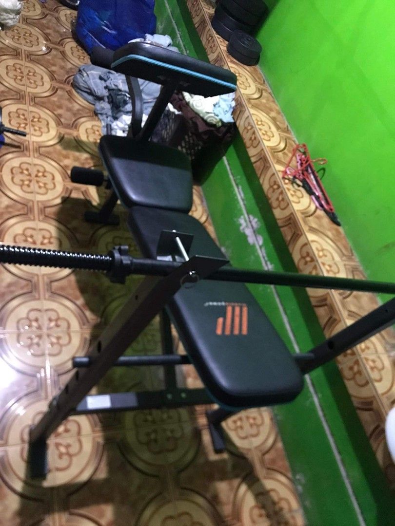 2ND HAND 6 IN 1 BENCH PRESS WITH BARBELL BAR AND 4 PC 5KG PLATES FREE