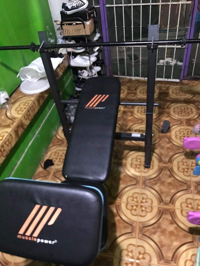 2ND HAND 6 IN 1 BENCH PRESS WITH BARBELL BAR AND 4 PC 5KG PLATES FREE