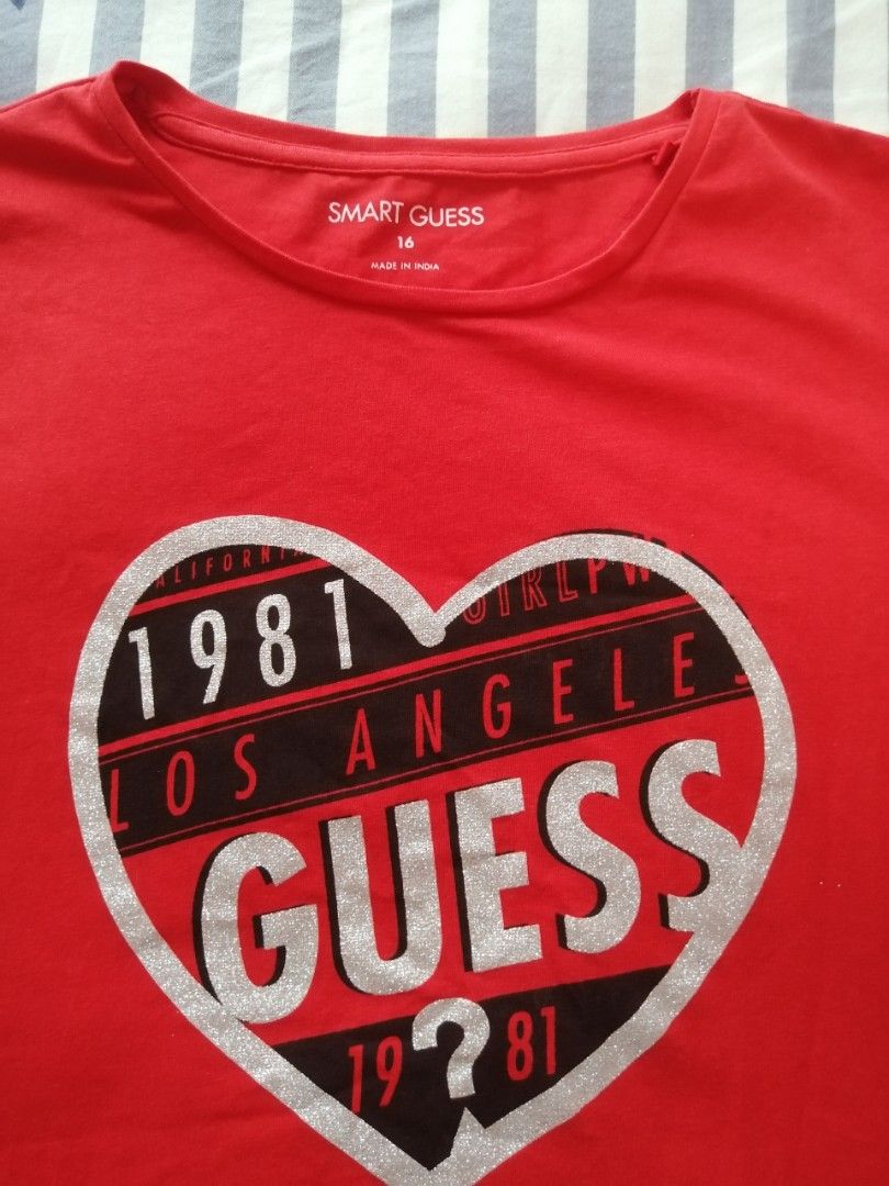Guess red store and black shirt