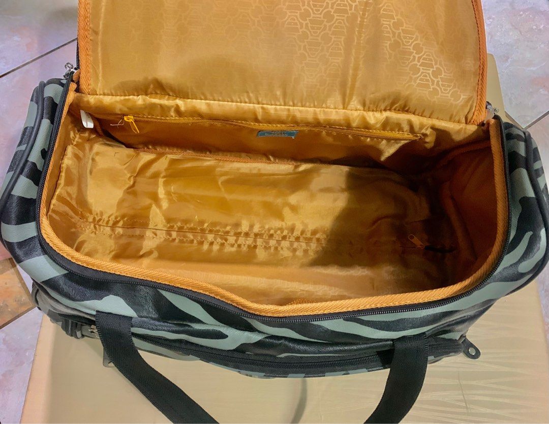 AUTHENTIC KATHY VAN ZEELAND BLACK AND GRAY ZEBRA CARRYON ROLLING DUFFLE