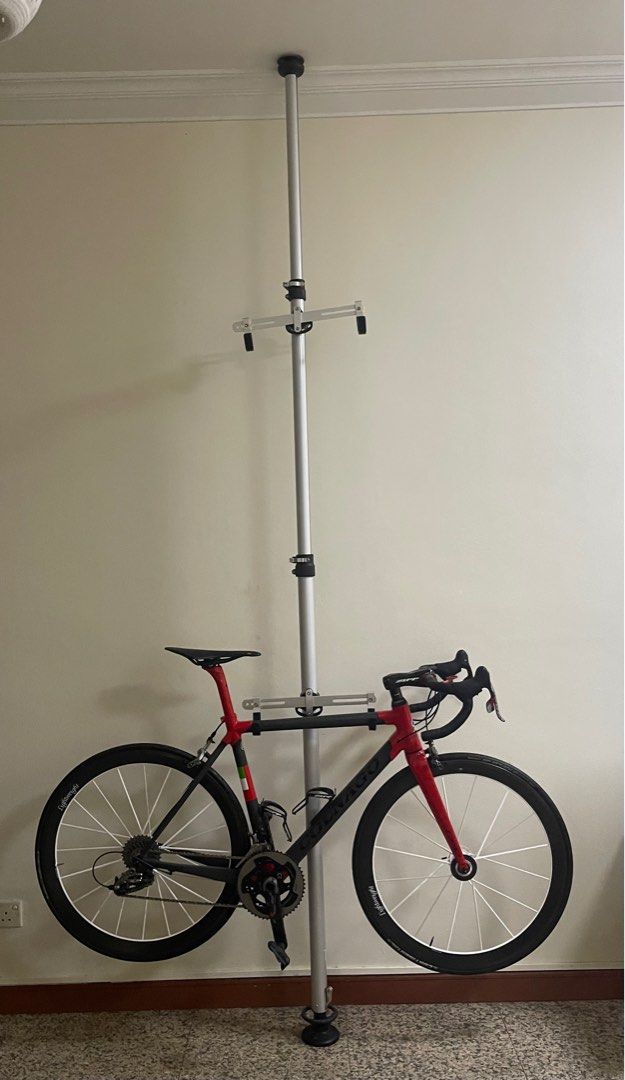 Bike stand. Two bike floor to ceiling extendable Sports Equipment Bicycles Parts Parts Accessories on Carousell