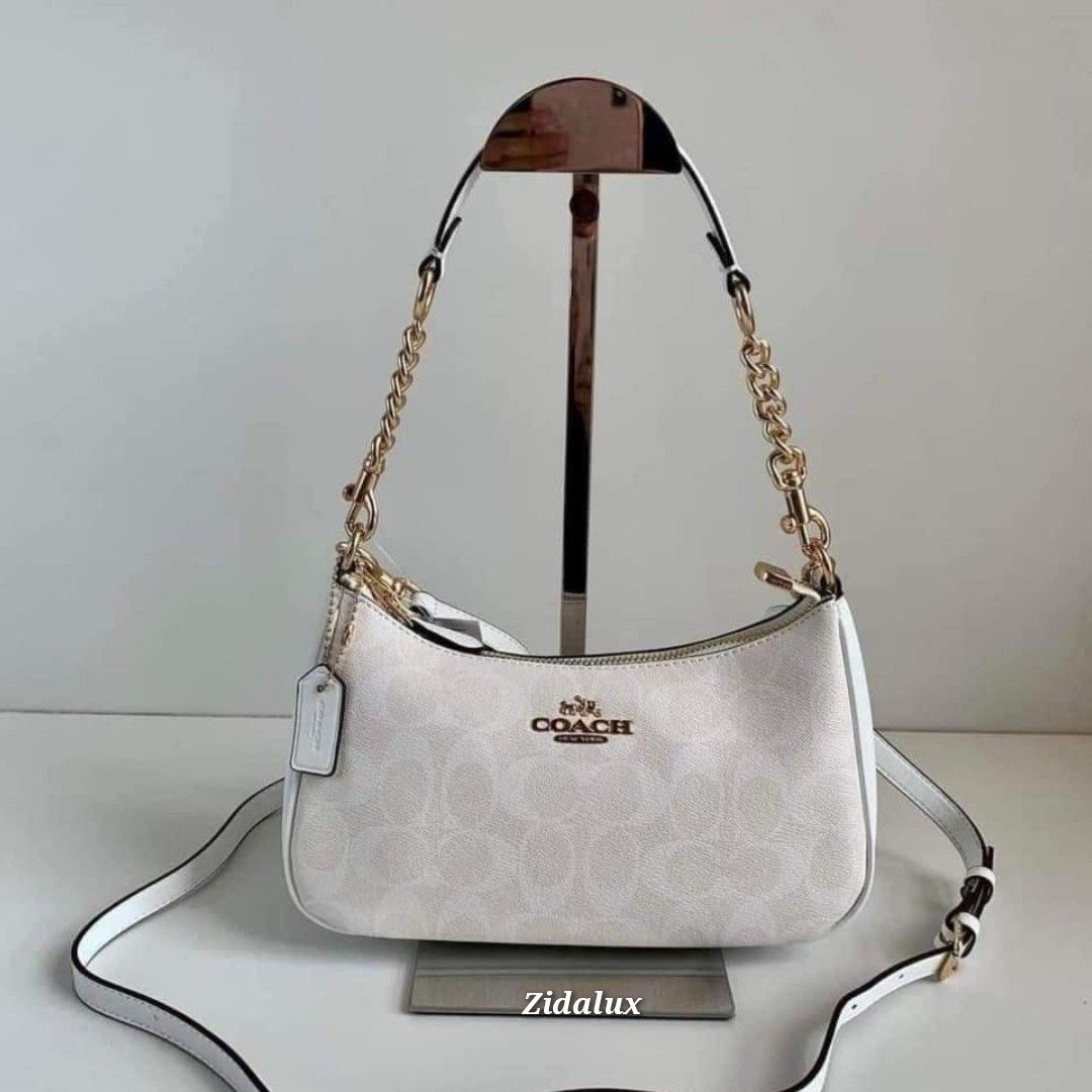 White coach purse with colored cheap c's