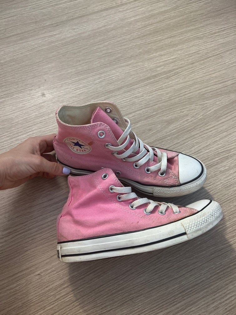 Baby pink chuck taylors top