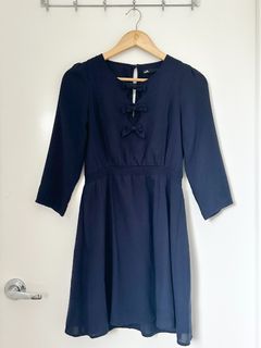 Dotti Navy Dress with keyhole and bow detail on front