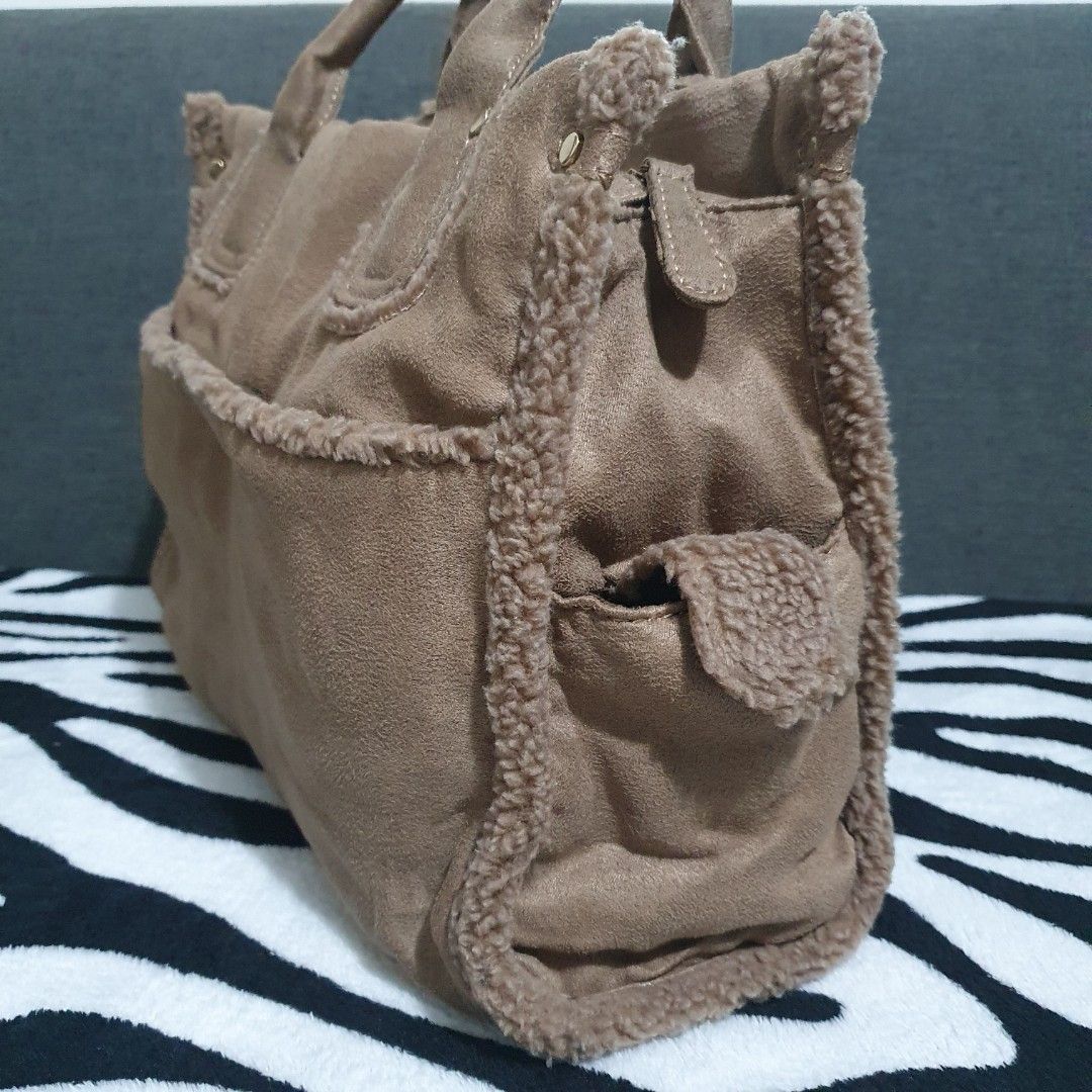 Hermes-inspired Soft Tote Bag (Category: Tote Bags) located in Pasig City. Submitted by _bcgs_ (Listing ID 1212021820, Image 3). Description: medium-sized cloth material (like soft flanel) with faux fur on the edges already washed so it is ready to use no flaws or stains or any other issues 💯 hardwares are still like new.