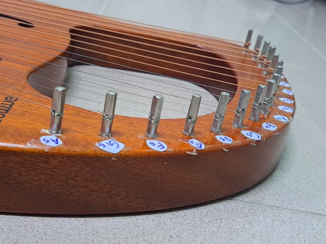 Ammoon lyre harp top