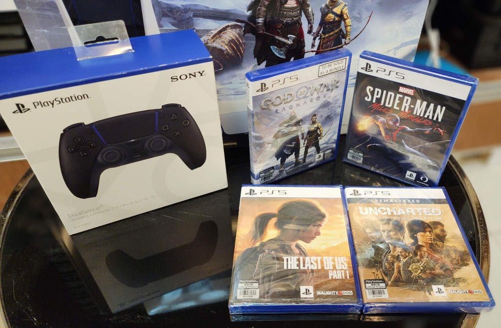 PS5 God of War bundle (Category: PlayStation) located in Paranaque City. Submitted by andcolli (Listing ID 1212024602, Image 2). Description: 46k Negotiable PS5 God of War bundle Complete with extra dual sense controller (black) Incl. Receipt of proof of purchase 4 Games included: 1) God of war ragnarok 2) Spiderman Miles Morales 3) The last of Us Part 1 4) Unchartered legacy of thieves collection Date of Purchase : Dec 3, 2022 ( still under warr
