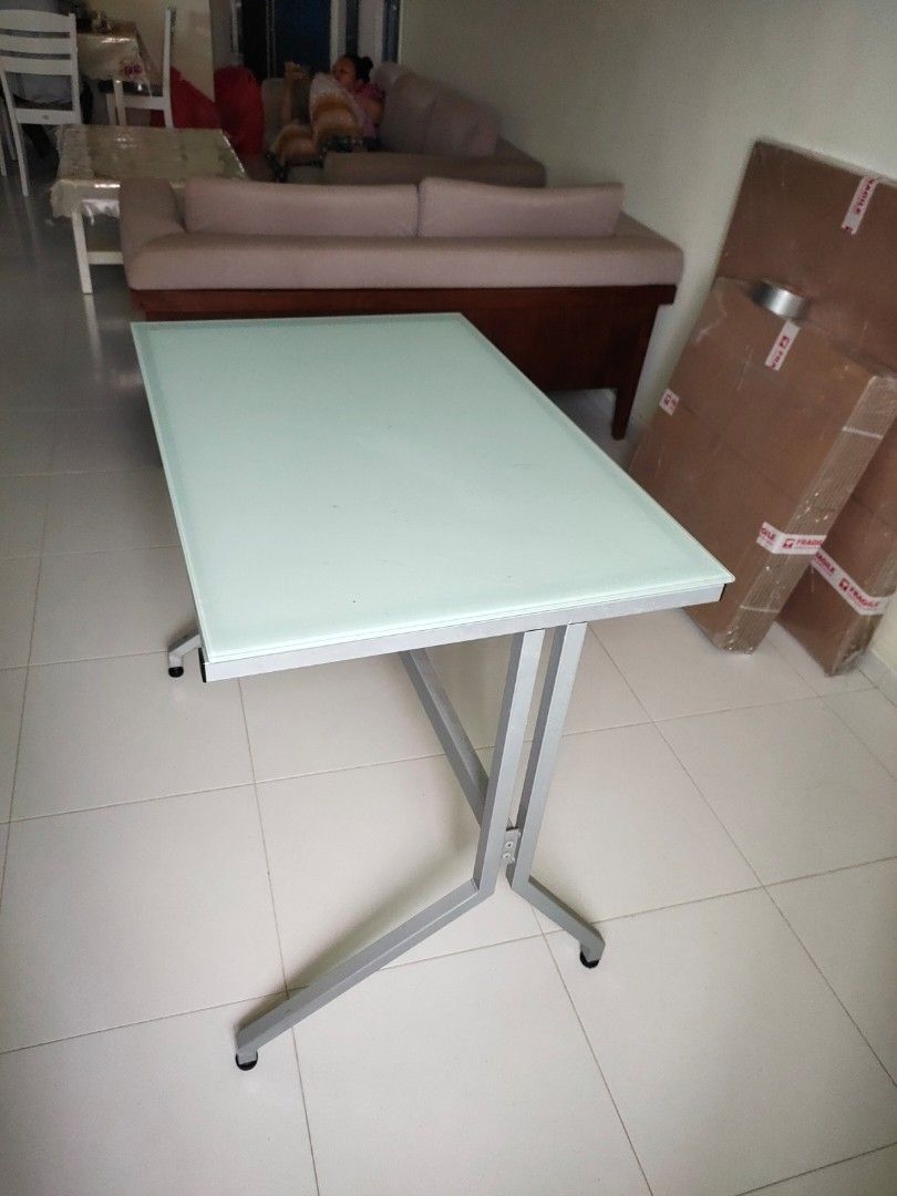 Table (Category: Tables & Sets) located in Singapore. Submitted by arffnhsn (Listing ID 1211948847, Image 3). Description: Used desktop/study table with glass top. Rarely used. Will need to cater for own self-collection at the address given..