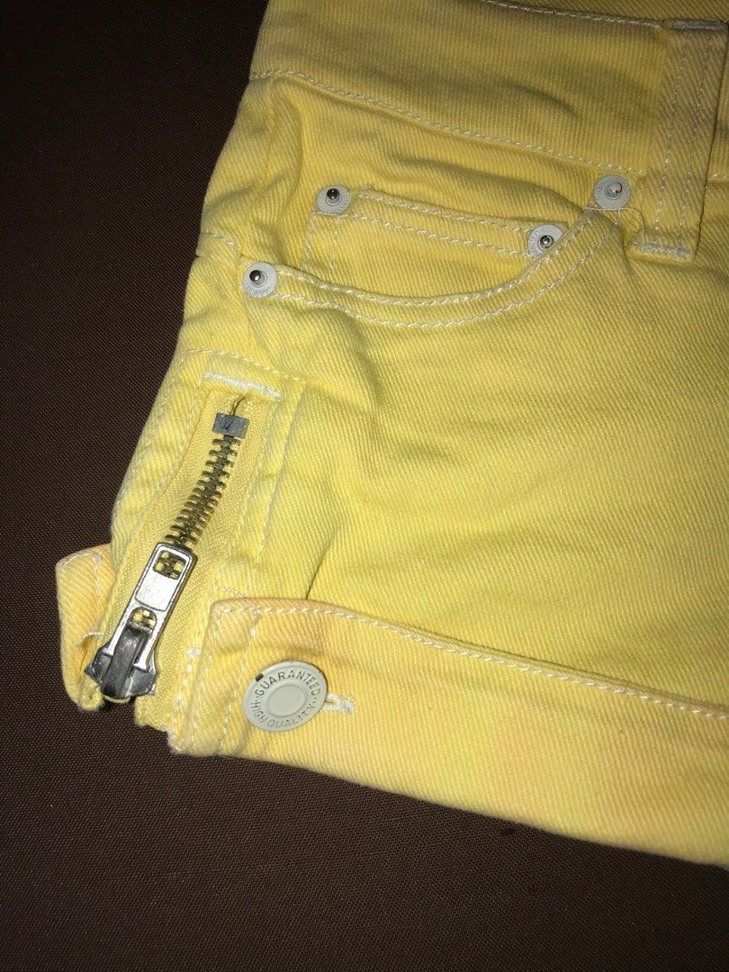 Yellow Shorts (with side zippers) (Category: Shorts) located in Antipolo. Submitted by shopanne (Listing ID 1211950998, Image 2). Description: See picture may onting stain lang po malapit sa zipper Size: 30 inches.