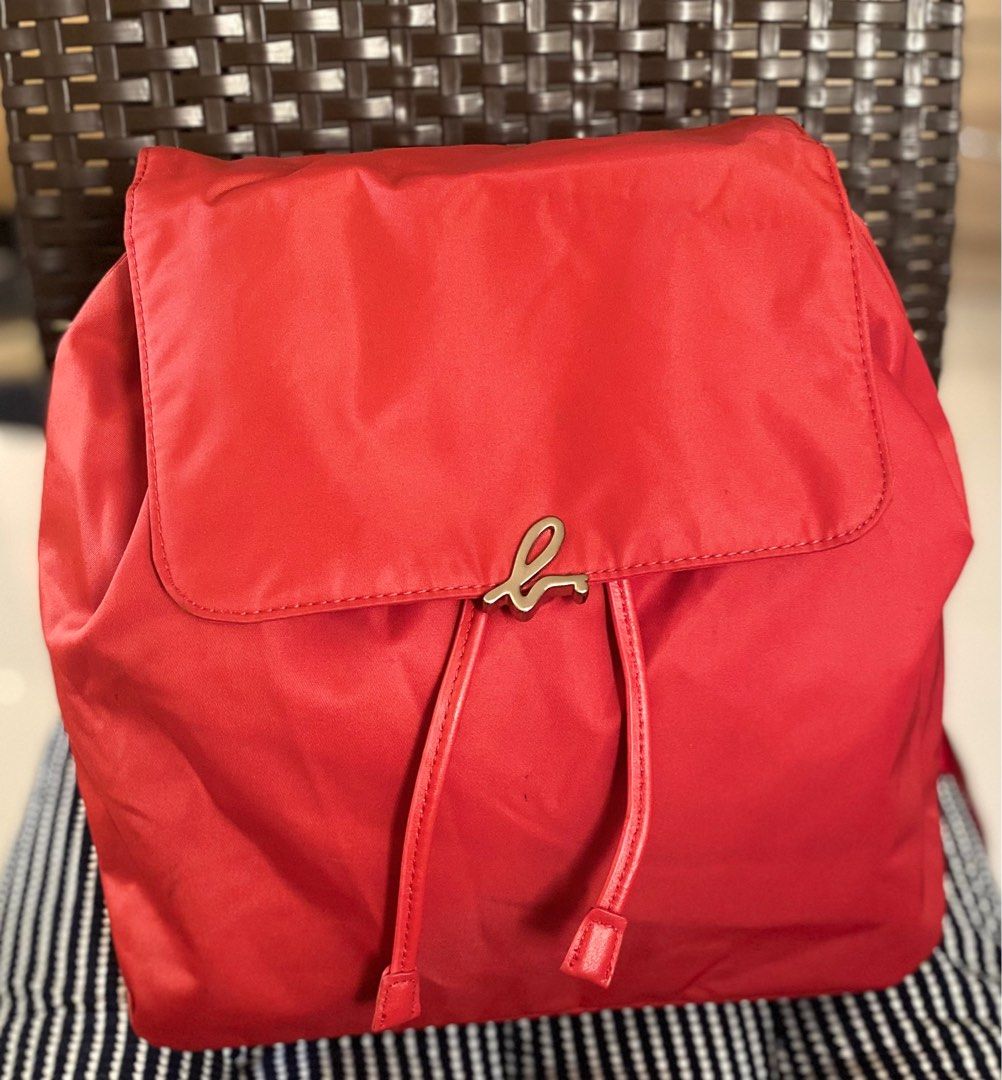 Agnes b backpack (Category: Luxury Bags & Wallets) located in Batac City. Submitted by fab_glam_preloved (Listing ID 1212218365, Image 1). Description: 10/10 condition red nylon material authentic orig price ₱19,000 (last photo) medium to semi large.