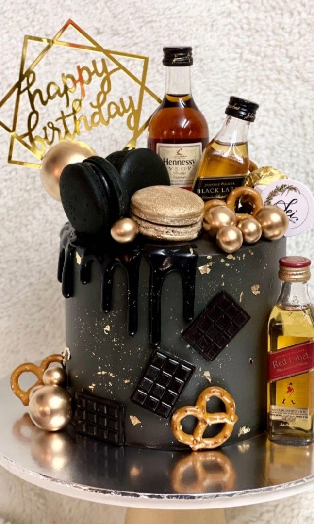 Whiskey Liquor Cake With Gold Balls And Drip