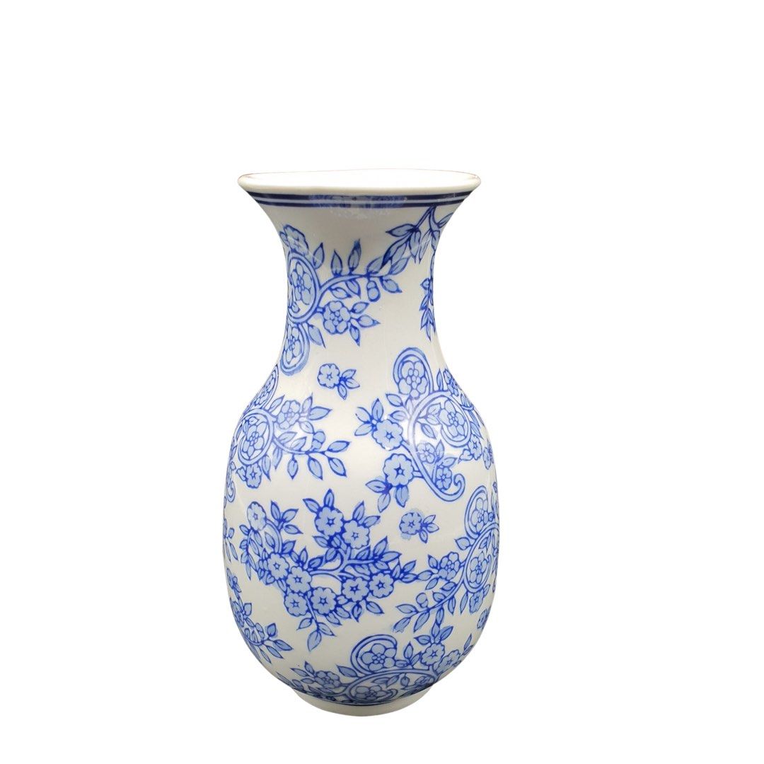 Blue and white floral vase (Category: Vases & Decorative Bowls) located in Pasig City. Submitted by mjferman66 (Listing ID 1212114589, Image 1). Description: 7 inches.
