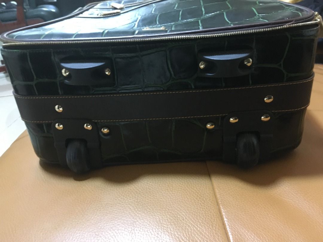 Dooney and top bourke rolling suitcase