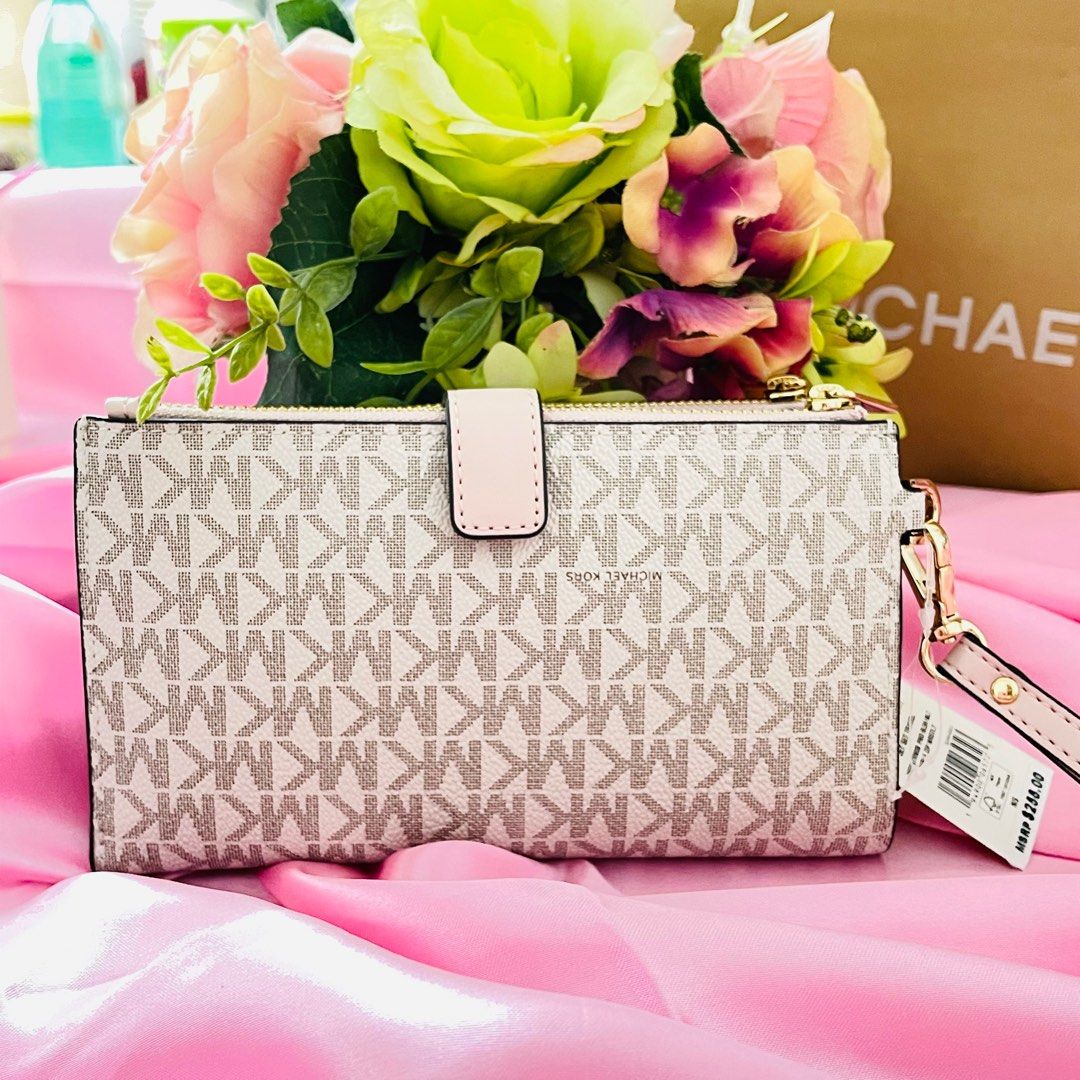 Michael kors pink on sale wristlet wallet