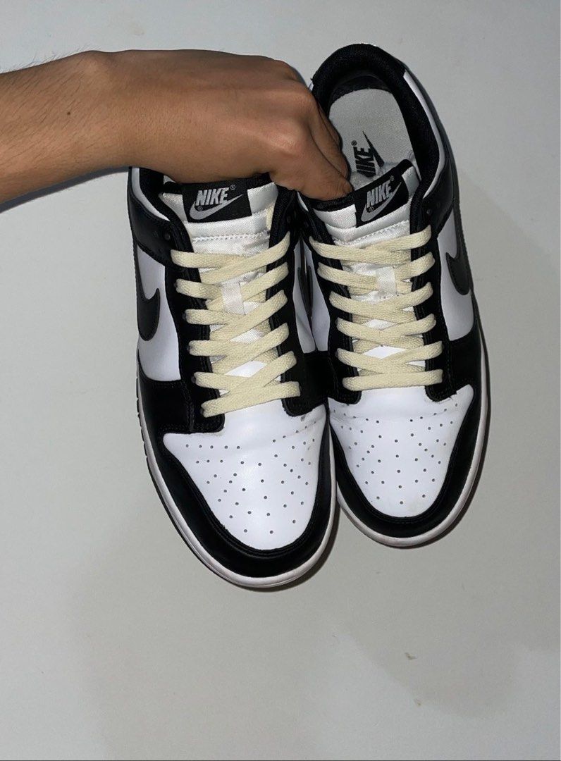 Nike panda dunk (Category: Sneakers) located in Singapore. Submitted by incessantobsession (Listing ID 1212168564, Image 1). Description: Nike panda dunks, US 9.5 laces changed to cream, have original laces, box included. Feel free to lc 100% authentic jd pair; condition 8.5/10 .