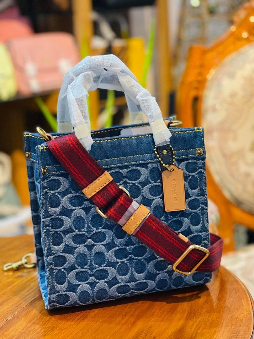💯ORIGINAL COACH FIELD TOTE 22 DENIM (Category: Luxury Bags & Wallets) located in Quezon City. Submitted by ashongsstore (Listing ID 1212121447, Image 1). Description: 🐎C0AÇH COLLECTION 🐎 🇵🇭ONHAND🇵🇭 ‼️Please look at our pictures as that is exactly what you are purchasing‼️ 💯GUARANTEED ORIGINAL AND AUTHENTIC or TRIPLE YOUR MONEY BACK! Not REPLICA, OEM, TOP GRADE QUALITY, AUTHENTIC QUALITY or Any other Terms to DENOTE FAKE! 😎 . . . Disclaim
