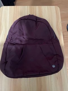 Pacsafe convertible backpack / sling bag - Maroon