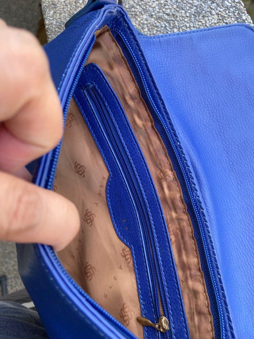 Sisley Sling Bag (Category: Cross-body Bags) located in Bocaue. Submitted by mamikyuti (Listing ID 1212103230, Image 3). Description: Original Sisley genuine soft leather Crossbody bag Removable strap(can replace) Had minor issues (please see last photos).