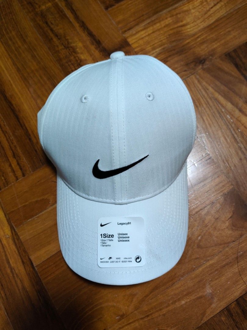 Authentic Nike white cap unisex, Men's Fashion, Watches & Accessories, Caps & Hats on Carousell