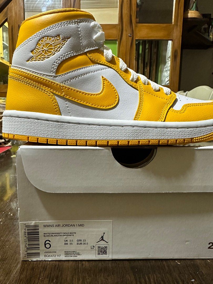 Nike air jordan 1 mid university gold sales