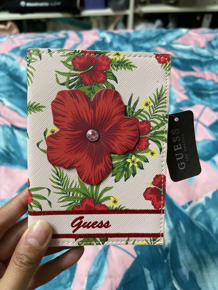 Guess authentic passport holder, Women's Fashion, Bags & Wallets