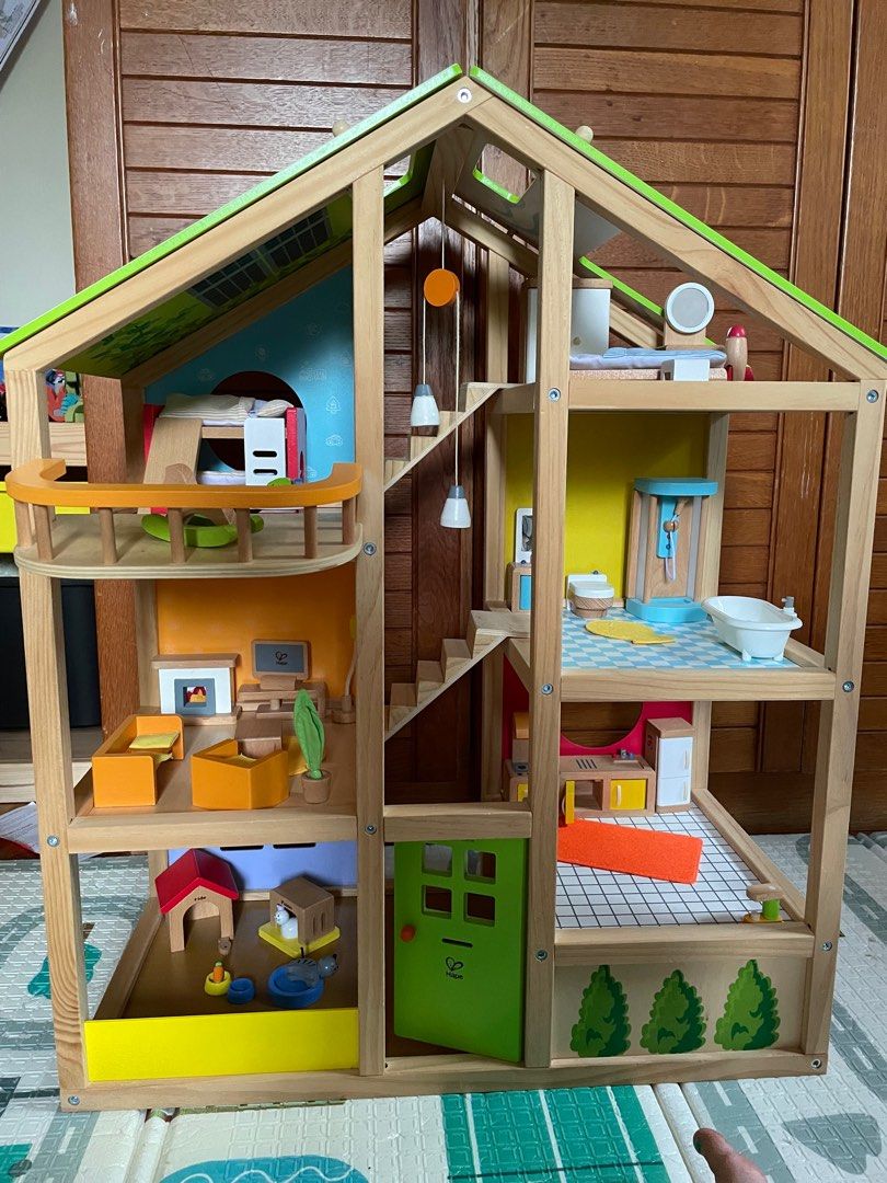Hape four shop seasons dollhouse