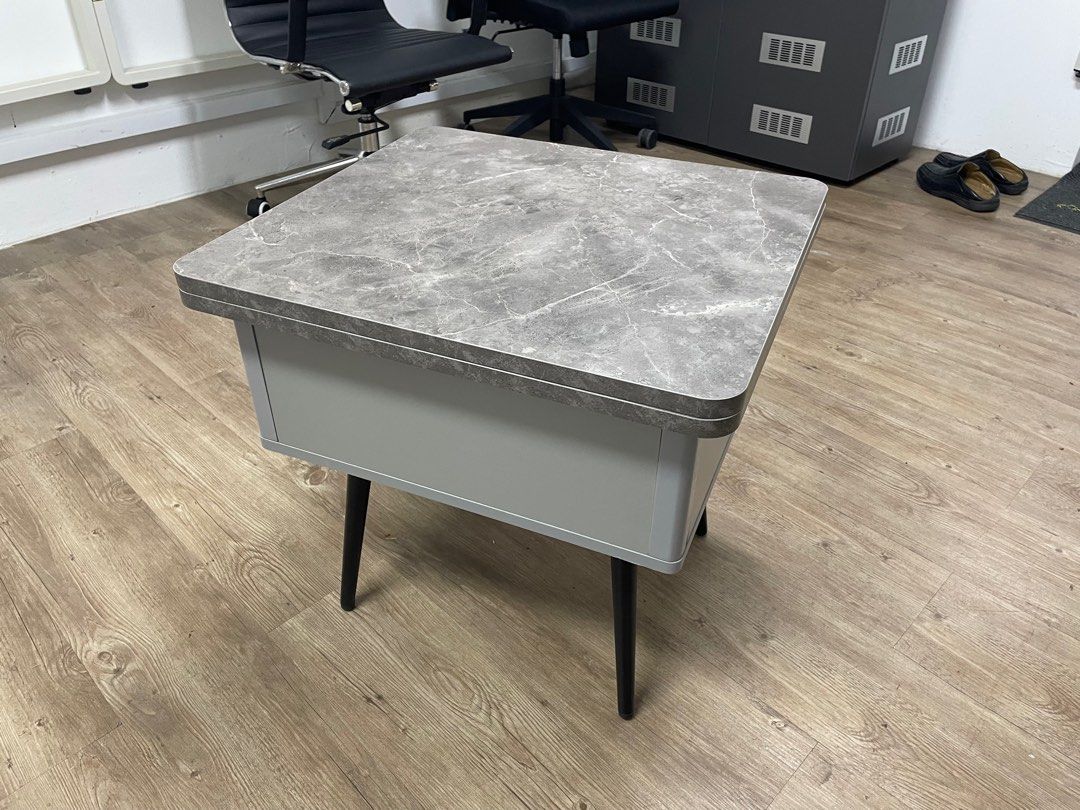 Multi-Function Coffee Table (Category: Tables & Sets) located in Singapore. Submitted by bokmu26 (Listing ID 1207178287, Image 2). Description: * Existing Stock only available in one color. Material: Laminate / Plywood Size: 500L x 550D x 528H (mm) when Closed 1000L x 500D x 725H (mm) when Open Delivery Charge: $80 No delivery charge for self-collection..